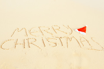 Merry Christmas written on sand