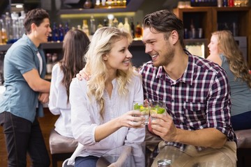 Young couple having a drink together