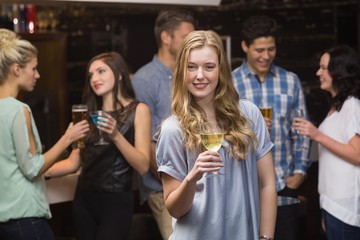 Pretty blonde having a glass of wine
