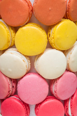 Colorful tasty macaroons in a row