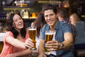 Young couple having a drink together