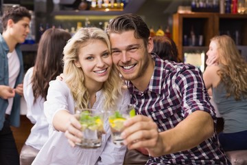 Young couple having a drink together