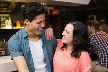 Young friends having a drink together