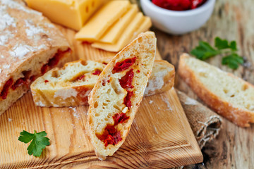 Fresh bread ciabatta with sun dried tomatoes