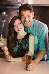 Young couple having a drink together