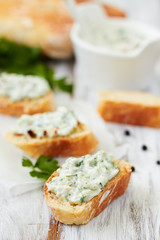 Greek appetizer(tzatziki) on a slice of bread