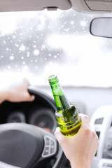 close up of man drinking alcohol while driving car