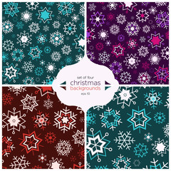Set of four christmas backgrounds with beautiful snowflakes