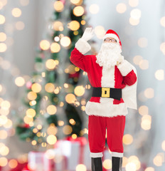 man in costume of santa claus with bag