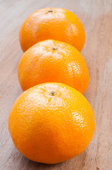 orange on a wooden table.