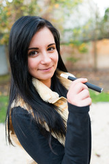 Woman smoking with electronic cigarette