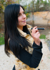 Woman smoking with electronic cigarette