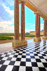 Grand Trianon courtyard and columns and garden in Palace of Vers