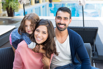 Family close to the pool