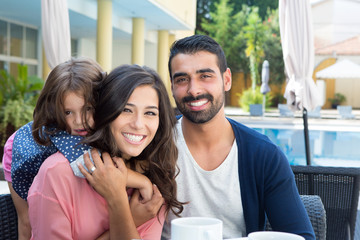 Family close to the pool