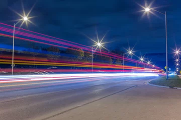 Wall murals Highway at night Road traffic and light trails at night