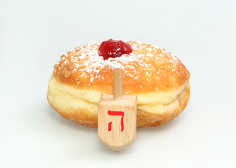 Hanukkah doughnut and spinning top