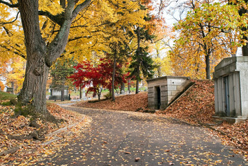 Cemetery Road Past Mausoleums in Fall