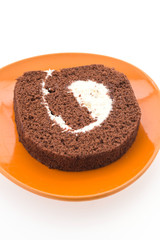 Jam roll cake isolated on white background