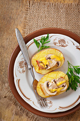 Baked potato with mushrooms and bacon