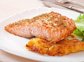 Baked salmon with honey-mustard sauce and potato gratin