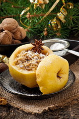 Baked apple with nuts, honey and oat flakes