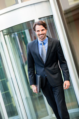 Businessman standing waiting for someone