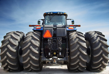 Farm tractor on huge wheels