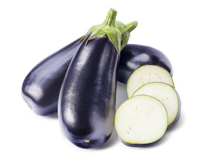 Three aubergines and slices isolated on white background