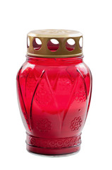 Red votive candle on white background