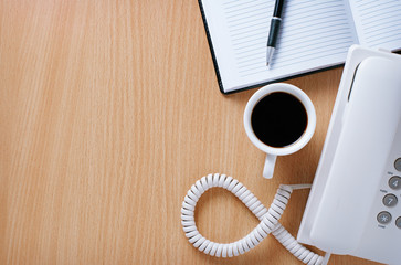 Cup of Coffee on the Table of Telephone Operator