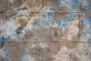cracked wall with paint remains