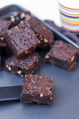 square crusty brownies on oven tray
