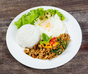 Rice topped with stir fried minced pork and basil