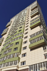 High residential buildings on the background of  blue sky