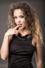 Obraz premium elegant fashionable woman in black dress