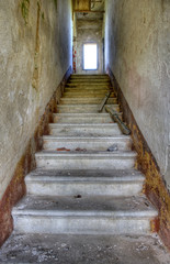 Fototapeta na wymiar Abandoned, derelict staircase.