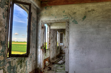 Abandoned, derelict building interior with nice view.