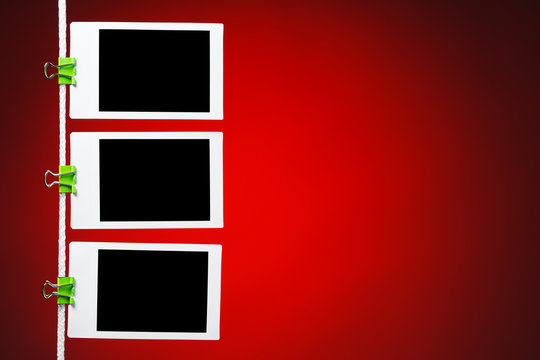 blank photos on red background