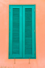 Italian style shutters in an old house
