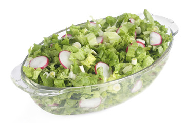 Fresh salad in glass bowl isolated on white background