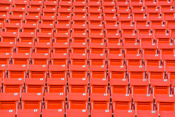 stadium, red seats on stadium steps bleacher
