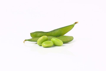 green soybeans on white background