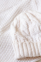 Fototapeta na wymiar White woolen knitted background