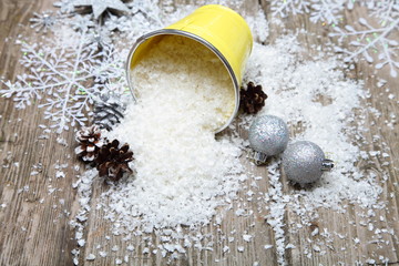Snow in decorative bucket