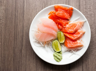 resh raw salmon on dish