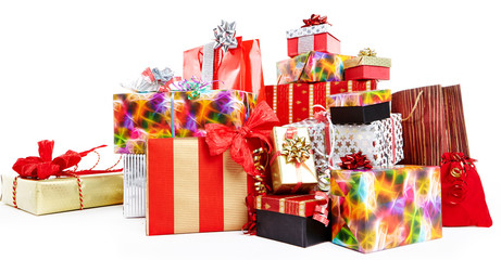 A pile of Christmas gifts in colorful wrapping with ribbons.