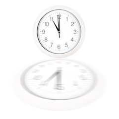 White clock face showing eleven o'clock