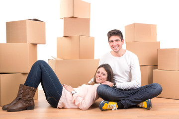 Happy couple with boxes