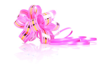 pink gift bow with a gold ribbon isolated on white background wi